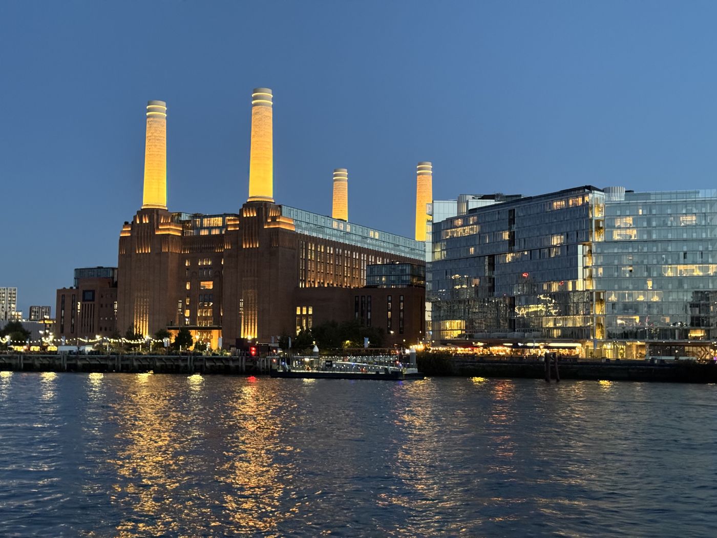 Battersea Power Station at dusk, seen across the River Thames