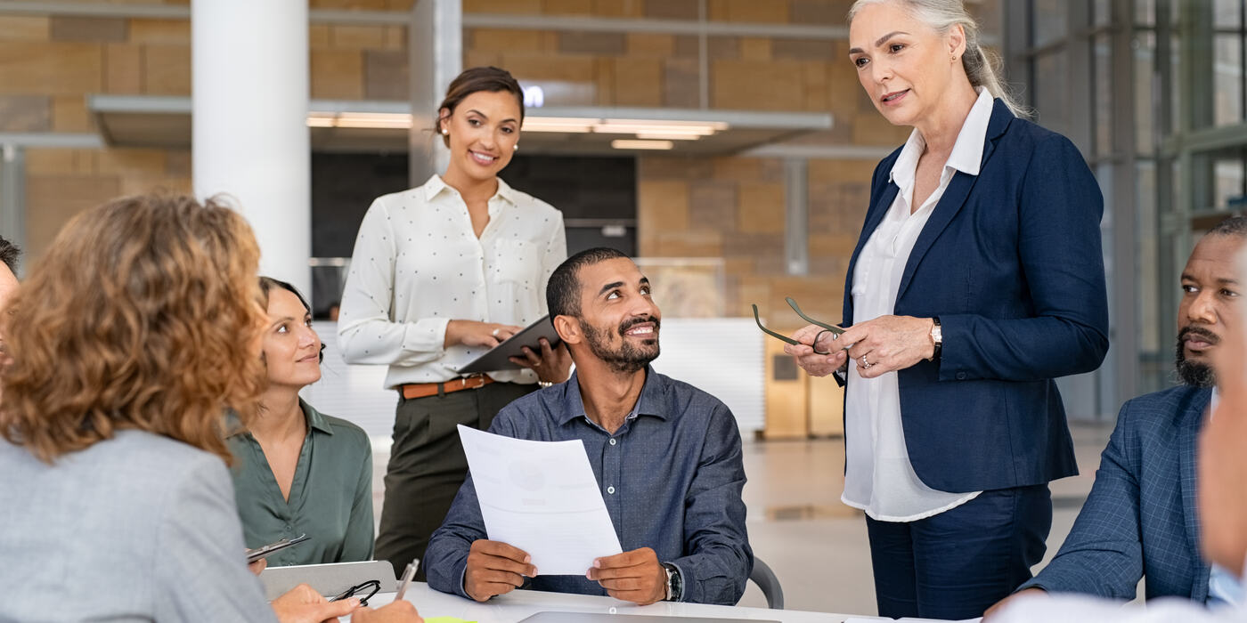 Business team reviewing a proposal together